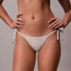 Slip da bikini a tinta unita con lacci laterali per i pantaloni e le gonne Slip da bikini a tinta unita con lacci laterali per i pantaloni e le gonne