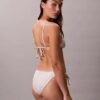 Slip da bikini a tinta unita con lacci laterali per i pantaloni e le gonne Slip da bikini a tinta unita con lacci laterali per i pantaloni e le gonne