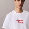 T-shirt comoda con grafica del logo 1989 T-shirt comoda con grafica del logo 1989