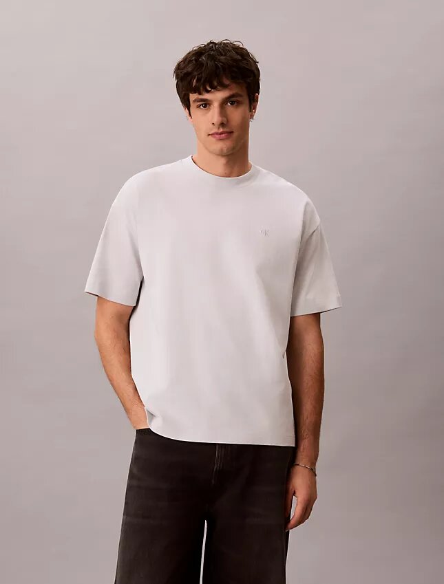T-shirt comoda con grafica Monologo effetto consumato T-shirt comoda con grafica Monologo effetto consumato