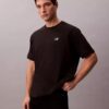 T-shirt comoda con logo grafico in piqué rinfrescante T-shirt comoda con logo grafico in piqué rinfrescante