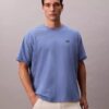 T-shirt comoda con logo grafico in piqué rinfrescante T-shirt comoda con logo grafico in piqué rinfrescante
