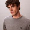 T-shirt comoda con Monogram ricamato T-shirt comoda con Monogram ricamato