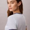 T-shirt corta con bordo a ringu e grafica con logo T-shirt corta con bordo a ringu e grafica con logo
