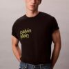 T-shirt dalla linea morbida con grafica circolare T-shirt dalla linea morbida con grafica circolare