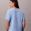 T-shirt squadrata con grafica Calvin Klein in corsivo T-shirt squadrata con grafica Calvin Klein in corsivo