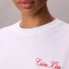 T-shirt squadrata con grafica Calvin Klein in corsivo T-shirt squadrata con grafica Calvin Klein in corsivo
