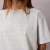 T-shirt squadrata con grafica del logo T-shirt squadrata con grafica del logo