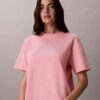 T-shirt squadrata con grafica del logo ad arco T-shirt squadrata con grafica del logo ad arco