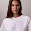 T-shirt squadrata con grafica del logo in stile script sbiadito T-shirt squadrata con grafica del logo in stile script sbiadito