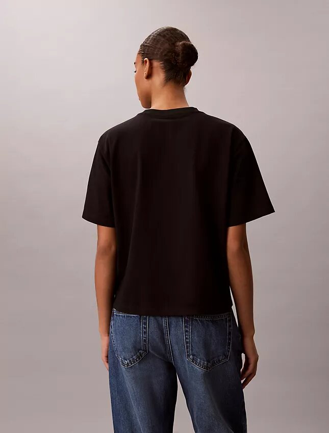 T-shirt squadrata con grafica del logo in stile script sbiadito T-shirt squadrata con grafica del logo in stile script sbiadito