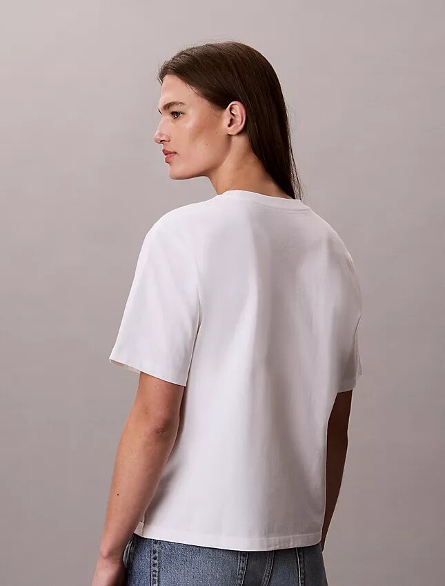 T-shirt squadrata con grafica del logo in stile script sbiadito T-shirt squadrata con grafica del logo in stile script sbiadito