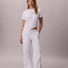 T-shirt squadrata con logo floreale T-shirt squadrata con logo floreale