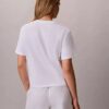 T-shirt squadrata con logo floreale T-shirt squadrata con logo floreale