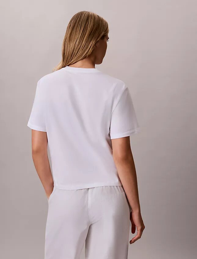 T-shirt squadrata con logo floreale T-shirt squadrata con logo floreale