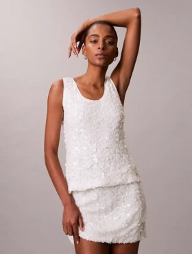 Top a spalline con paillettes