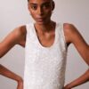 Top a spalline con paillettes