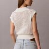 Top corto all’uncinetto con monogramma Top corto all’uncinetto con monogramma