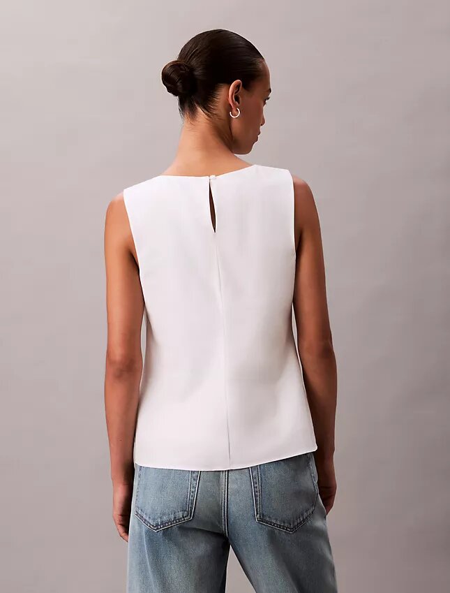 Top senza maniche in cotone con drappeggio asimmetrico Top senza maniche in cotone con drappeggio asimmetrico