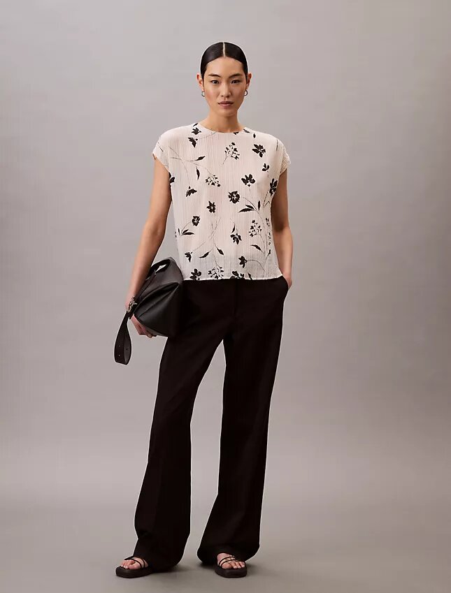 Top smockato con stampa floreale Top smockato con stampa floreale