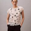 Top smockato con stampa floreale Top smockato con stampa floreale