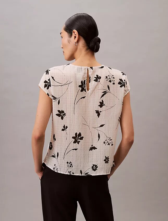 Top smockato con stampa floreale Top smockato con stampa floreale