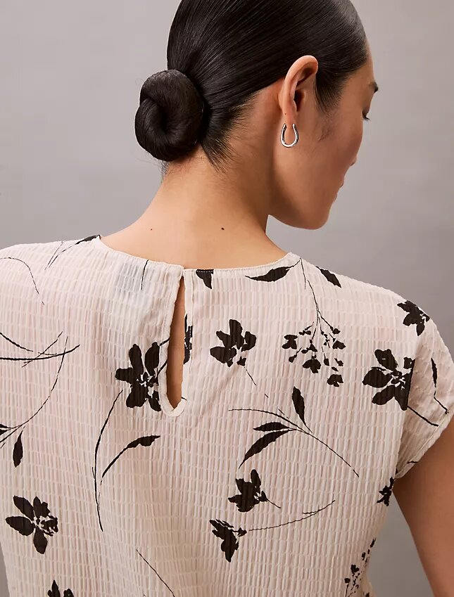 Top smockato con stampa floreale Top smockato con stampa floreale