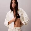 Trucker Jacket in Denim con vita stretta Trucker Jacket in Denim con vita stretta